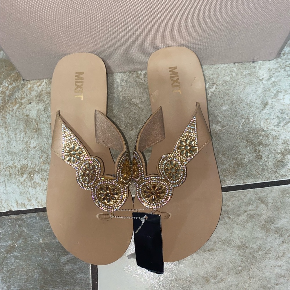 Tan Mixit flats size 7